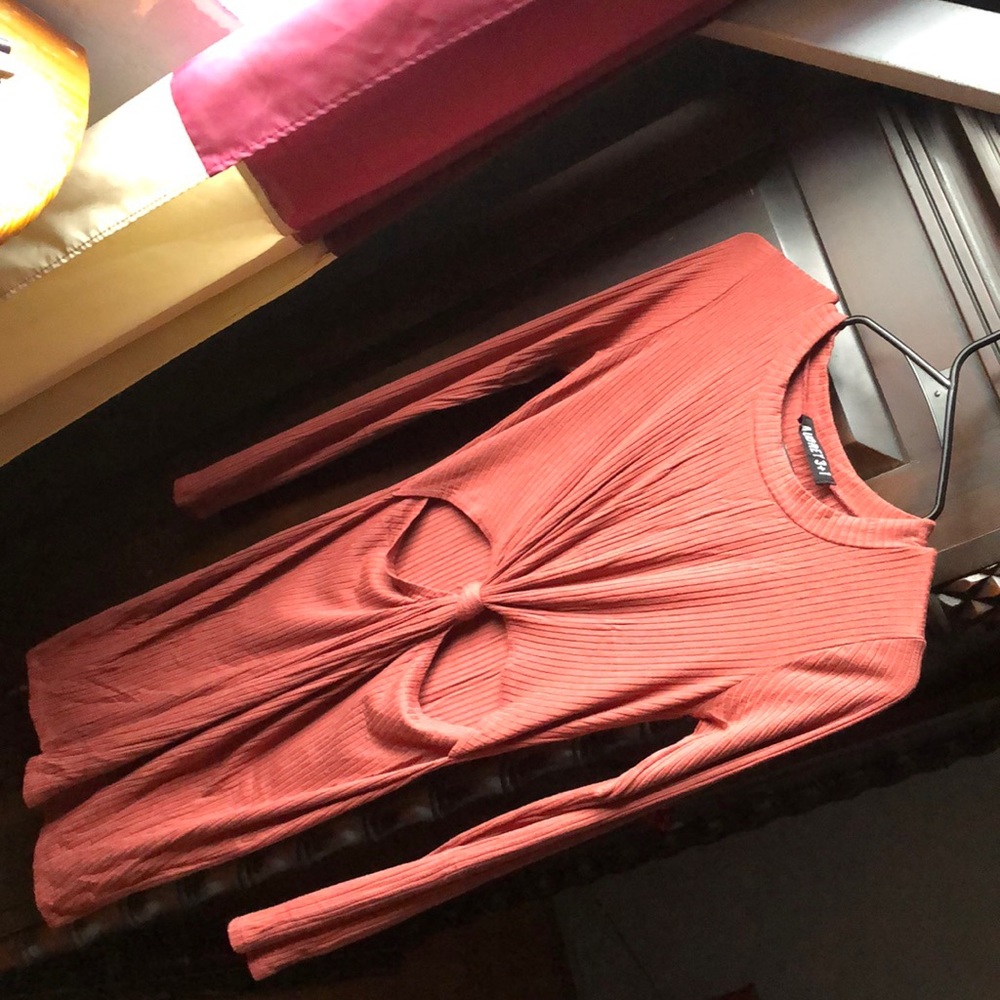 Long sleeve dress with a sexy cut on the front